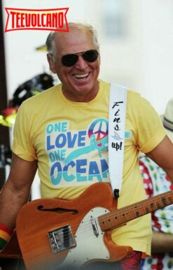 Musician Jimmy Buffett Wearing One Love One Ocean T-Shirt